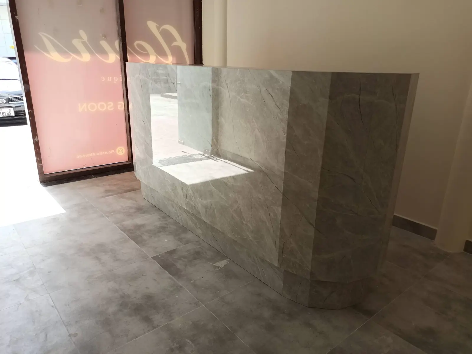Carpentry in Nad Al Sheba: curved joinery with marble top made by Bamboo Woodworks